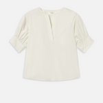Light-colored blouse on a white background