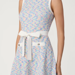 woman in multicolor dress on white background 