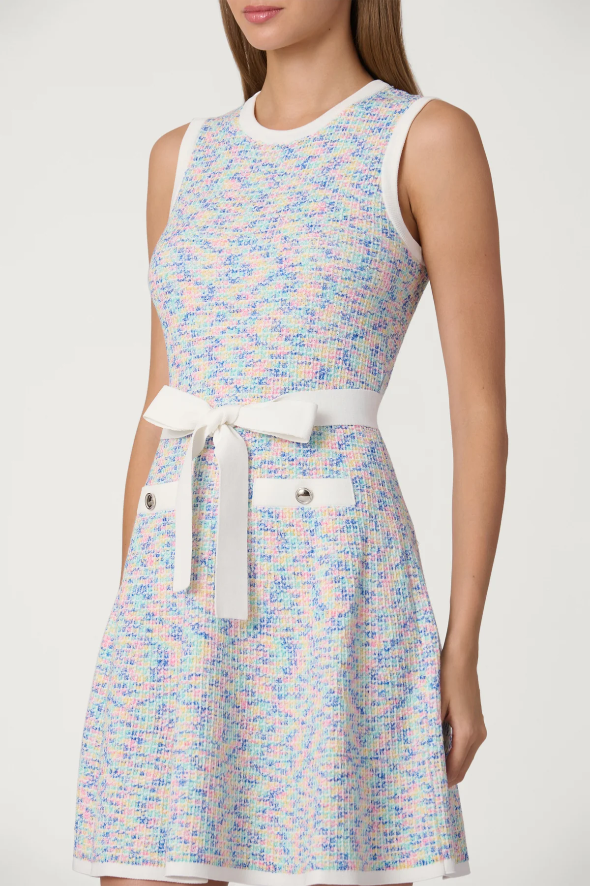 woman in multicolor dress on white background 