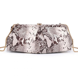 A snakeskin-patterned clutch bag with a gold-tone chain strap, displayed against a plain white background.
