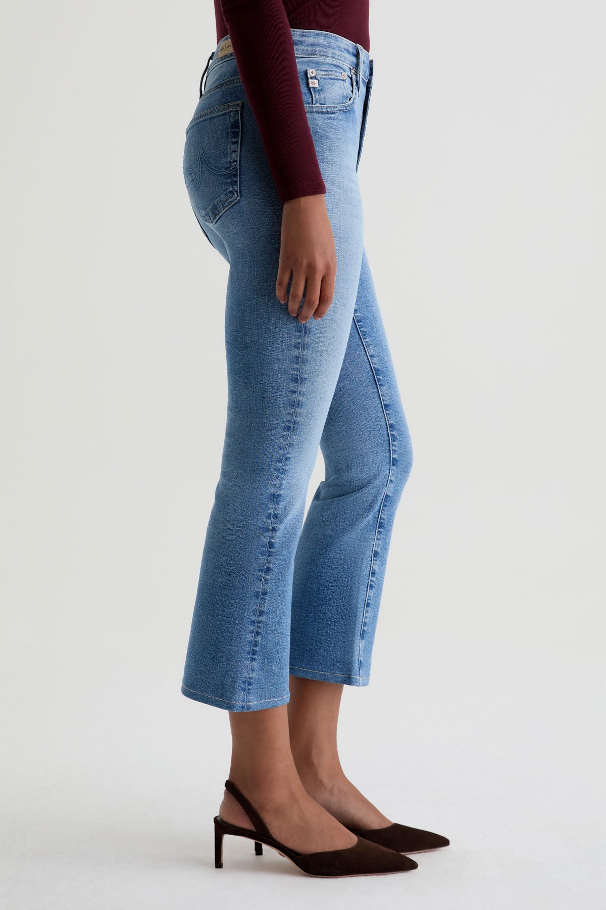 Mid-rise cropped bootcut jeans in a classic denim wash