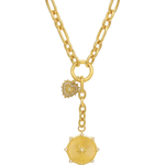 Gold necklace with heart and sun pendant on a white background