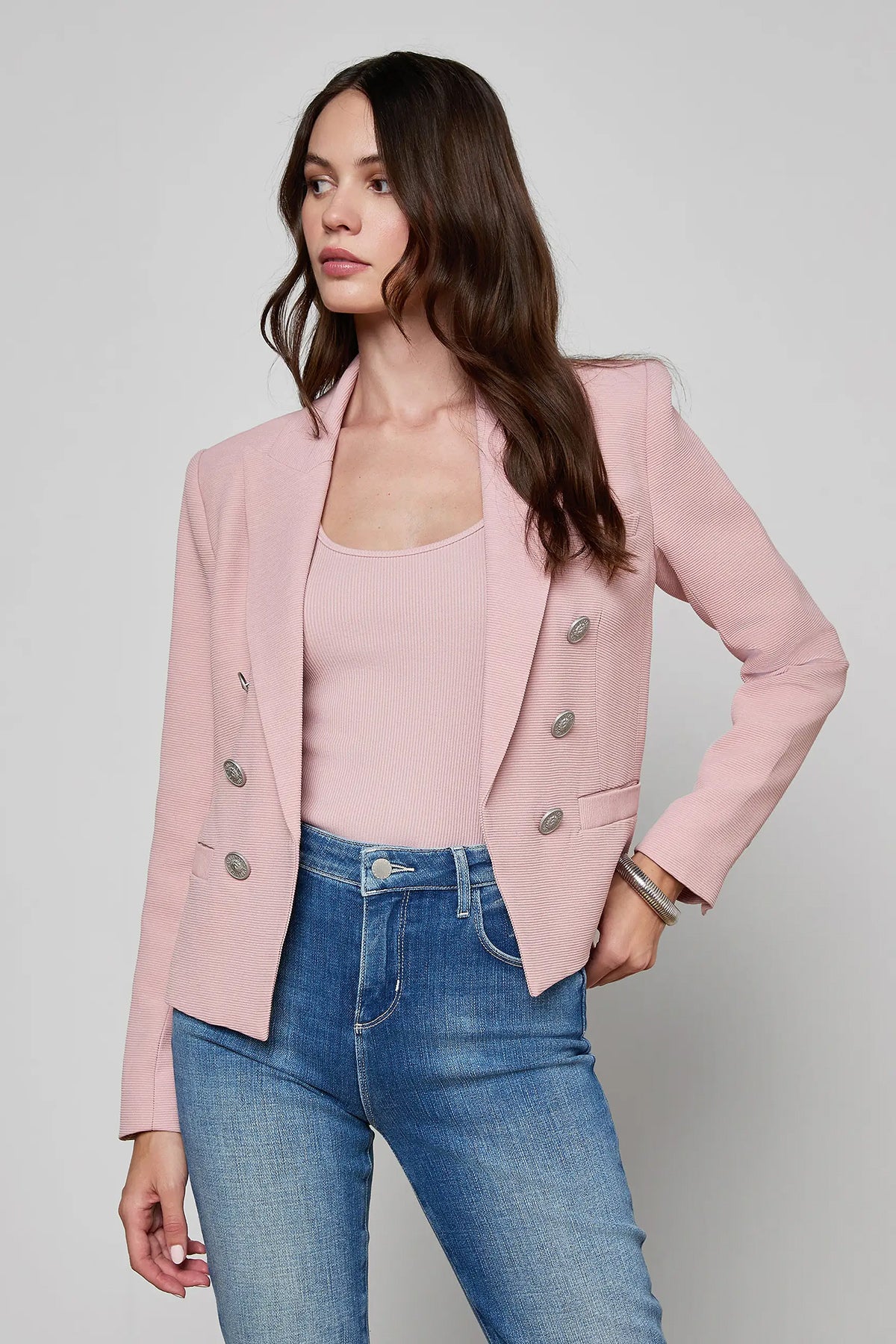 Tailored blazer with clean lines in a soft pink tone