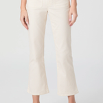 Person wearing white ribbed pants on a plain background
