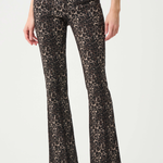 Leopard print pants worn by a person on a white background