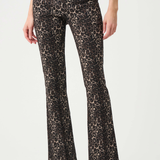 Leopard print pants worn by a person on a white background
