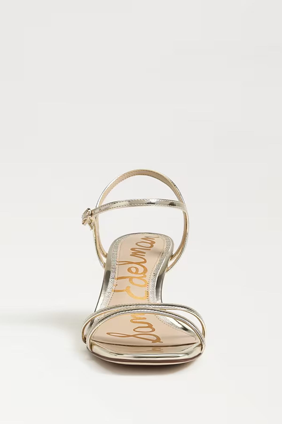 Gold sandal with 'Sam Edelman' branding on a white background