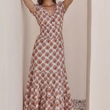 Printed midi dress with a flowing silhouette, styled for everyday wear.
