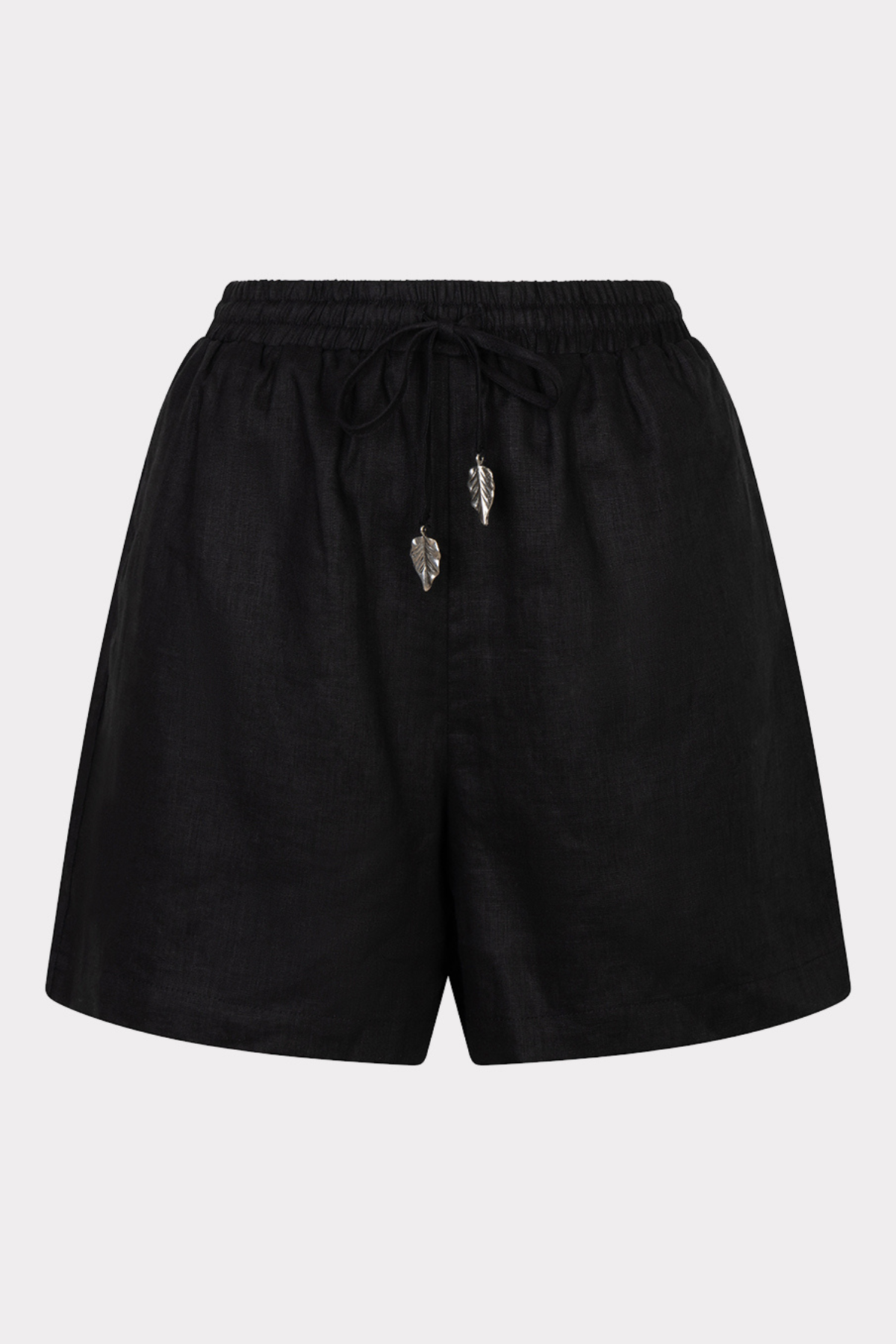 Black shorts with decorative elements on a white background