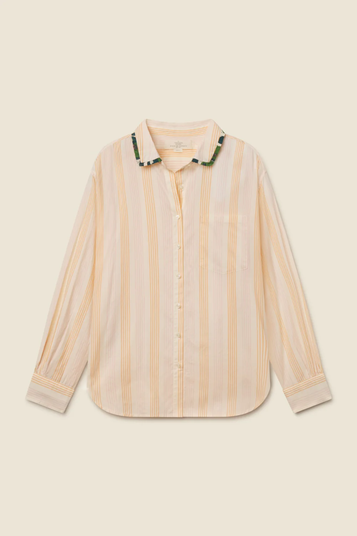 striped button down on tan background 