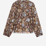 A long-sleeve blouse with a brown base and an all-over floral print in muted blue, beige, and gold tones, displayed flat against a light gray background.
