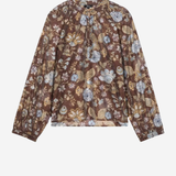 A long-sleeve blouse with a brown base and an all-over floral print in muted blue, beige, and gold tones, displayed flat against a light gray background.