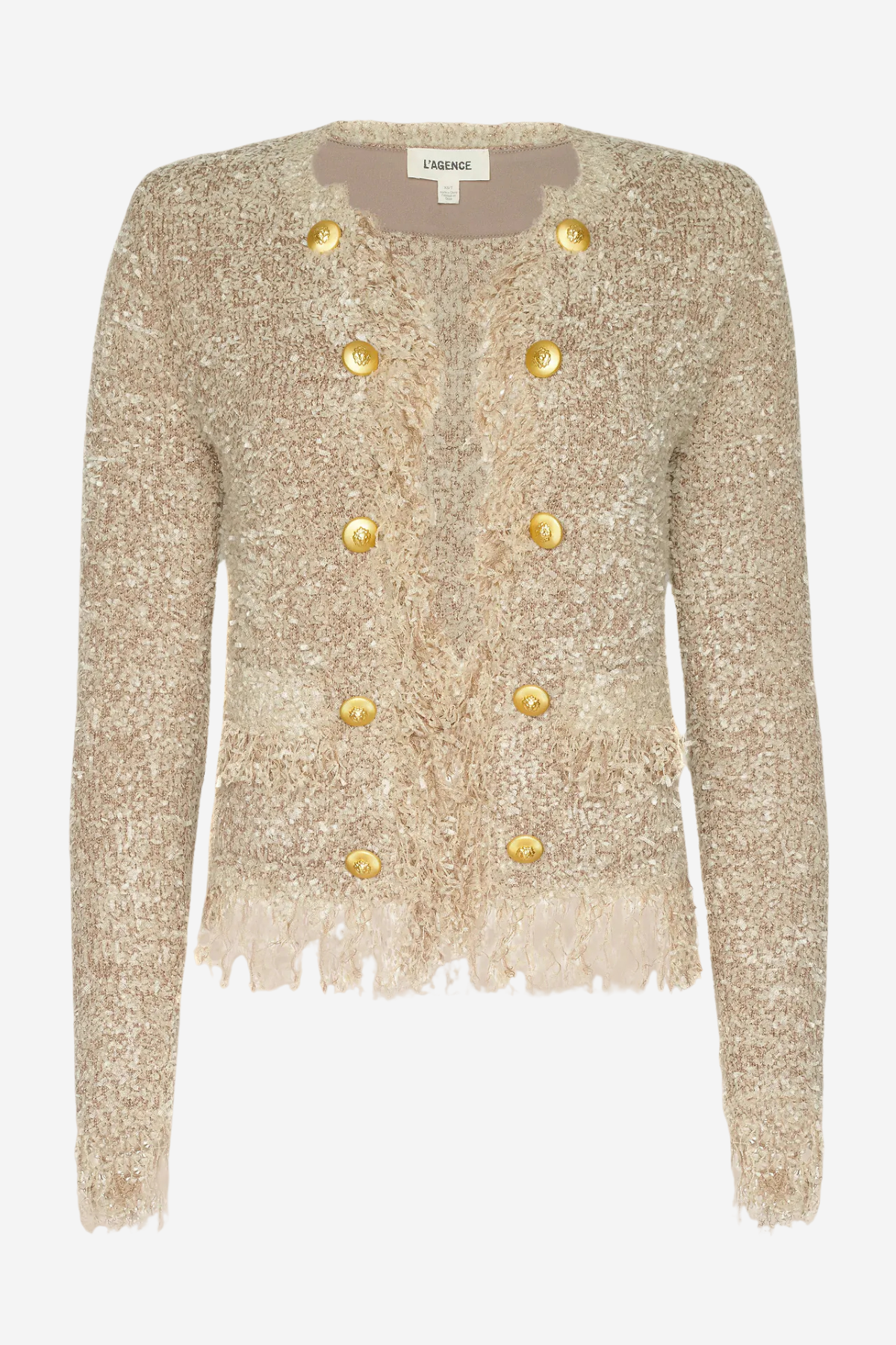 A cropped, long-sleeve tweed jacket in a textured champagne beige with gold buttons and fringe detailing, shown against a plain light gray background.