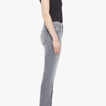 Woman wearing grey straight-leg jeans with a soft, structured fit and clean lines