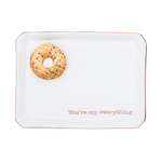 A white rectangular ceramic tray with rounded corners, featuring a small donut illustration in the upper left and the phrase 'You're my everything' in rose gold lettering near the bottom. The tray is shown on a clean white background.