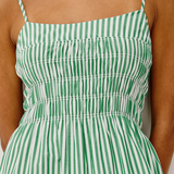Green and white striped dress worn by a person