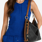 Large structured tote bag with sturdy shoulder straps and a spacious interior designed for everyday use.