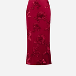 A red midi skirt with a floral jacquard pattern, shown flat against a light gray background.
