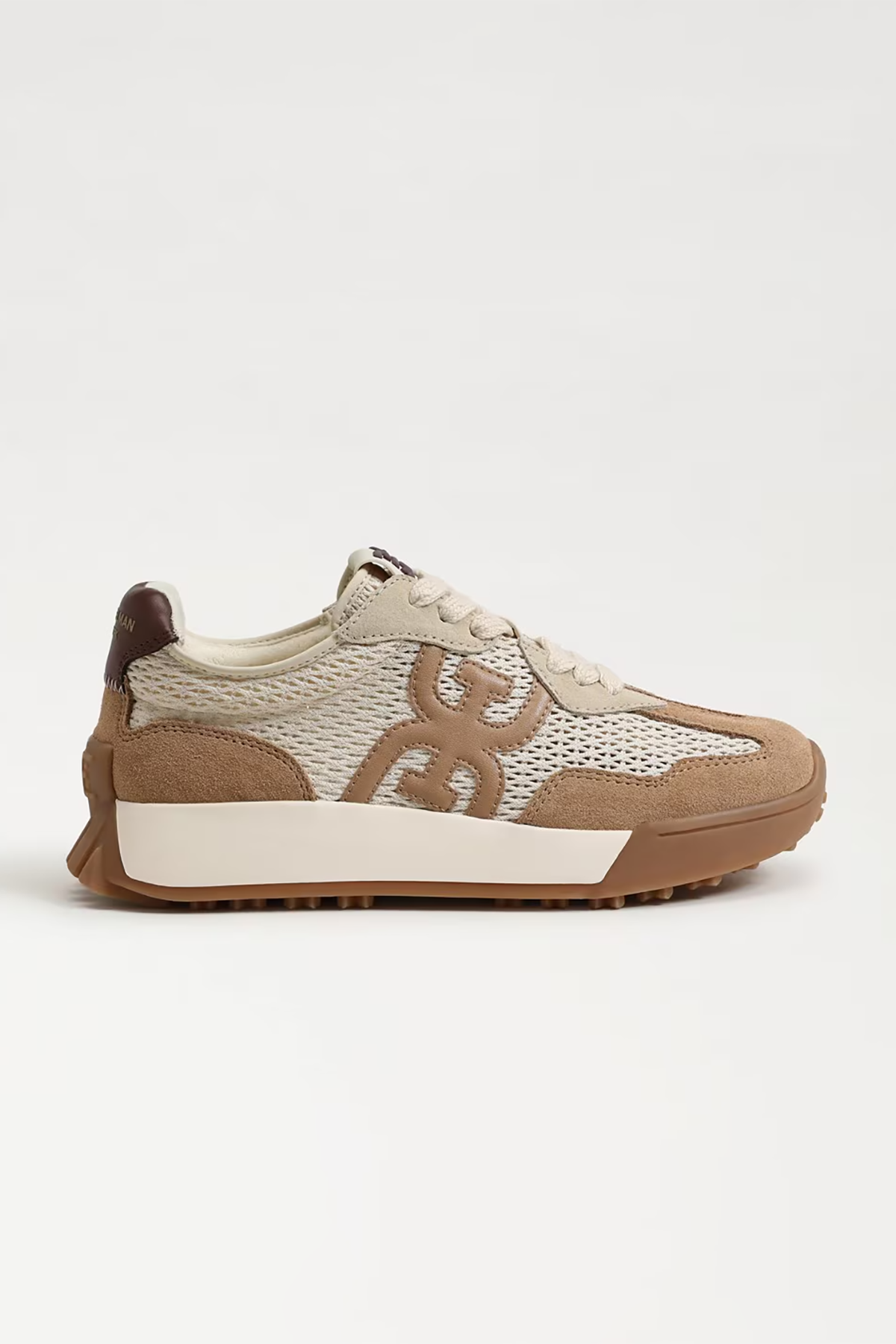 Beige sneaker with brown accents on a white background
