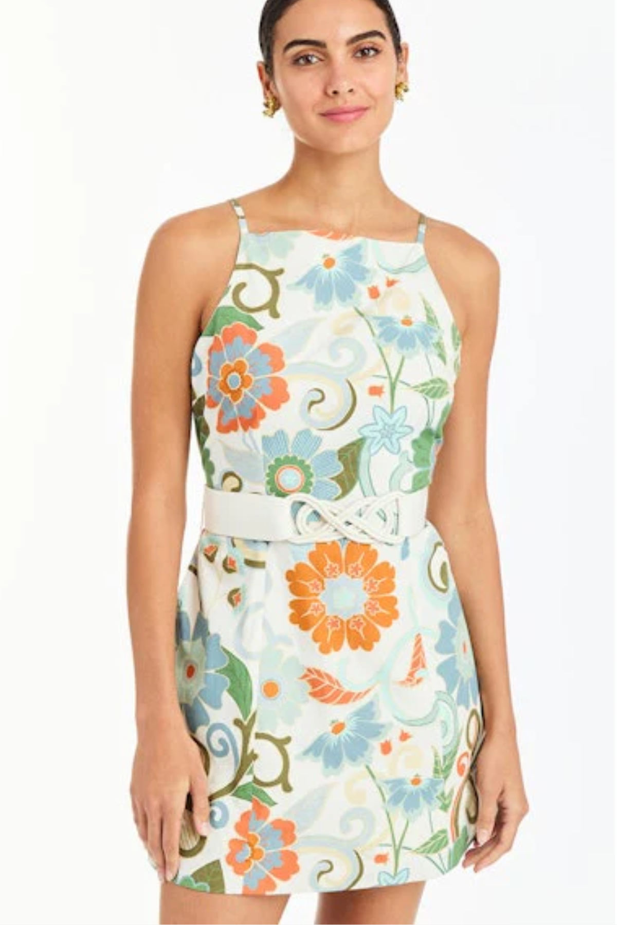 Woman wearing a floral dress with a white background