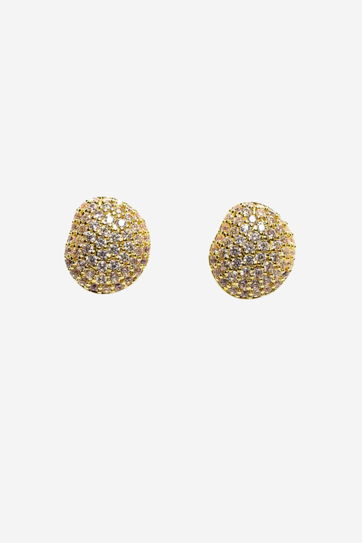 Gold earrings with blue gemstones on a white background