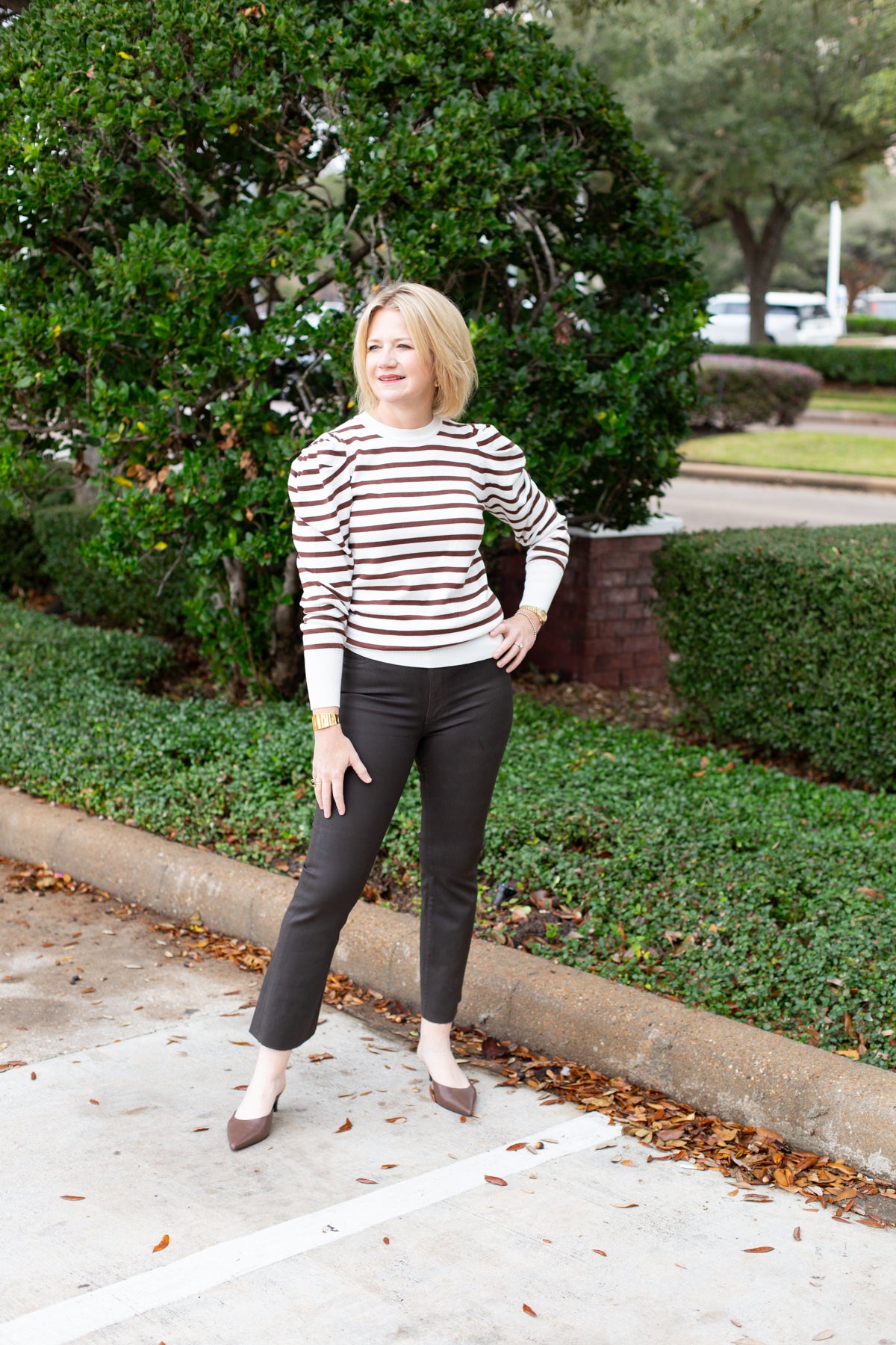 Striped knit sweater top styled for everyday wear.