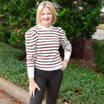 Striped knit sweater top styled for everyday wear.