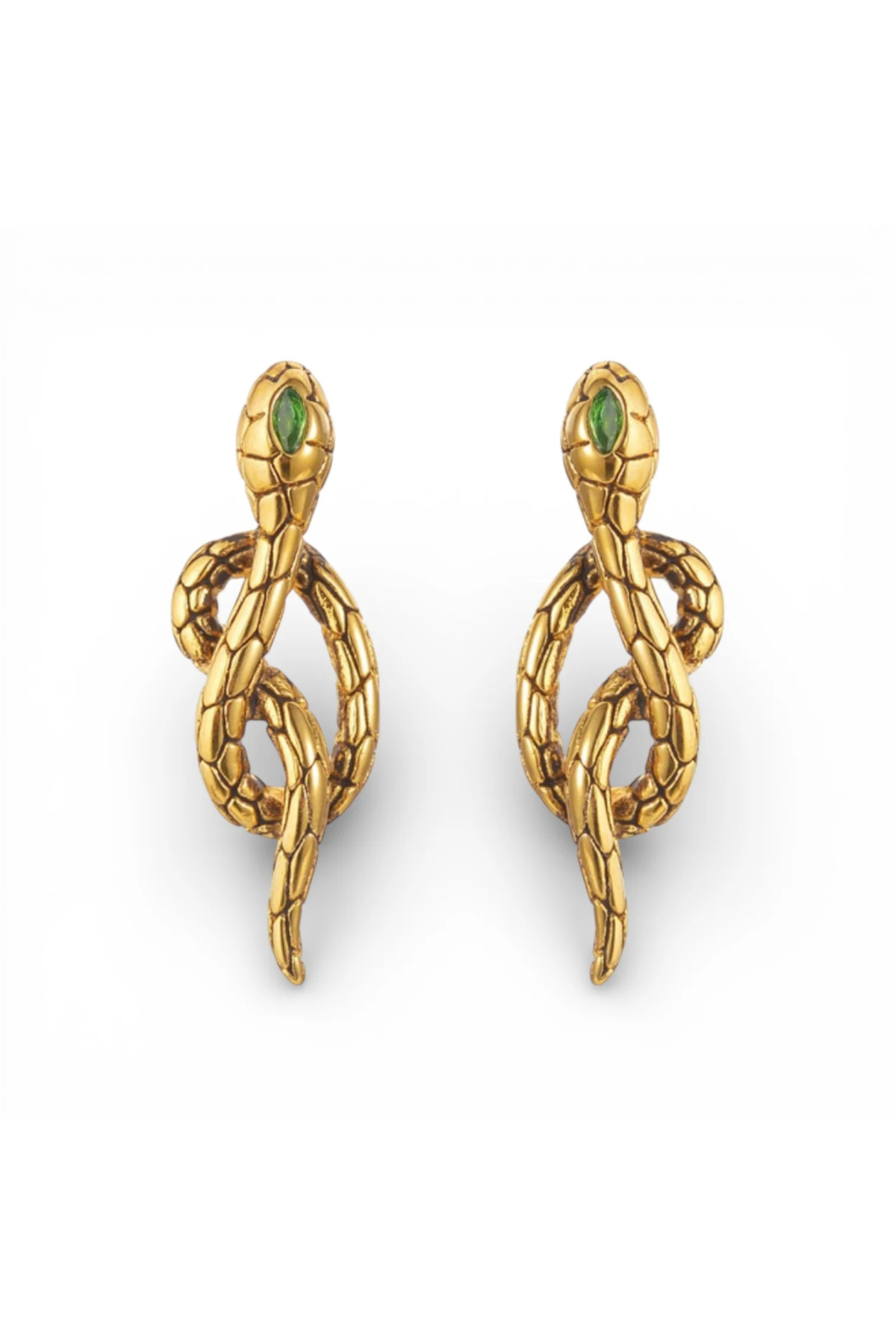 Gold snake-shaped earrings with green gemstones on a white background