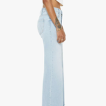 Light blue jeans worn by a person on a white background