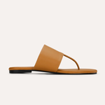 Tan sandal on a white background