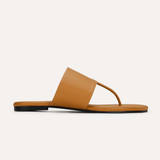 Tan sandal on a white background
