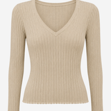 A beige ribbed knit long-sleeve V-neck top, shown on a ghost mannequin against a plain white background.