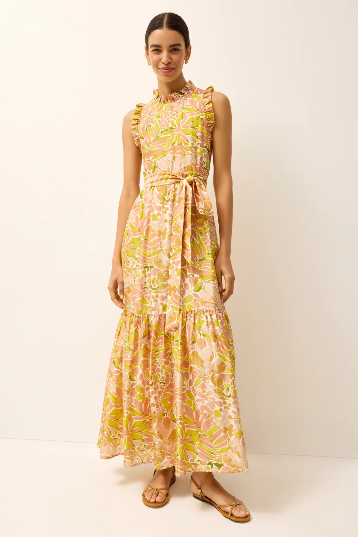Woman wearing a floral dress on a white background