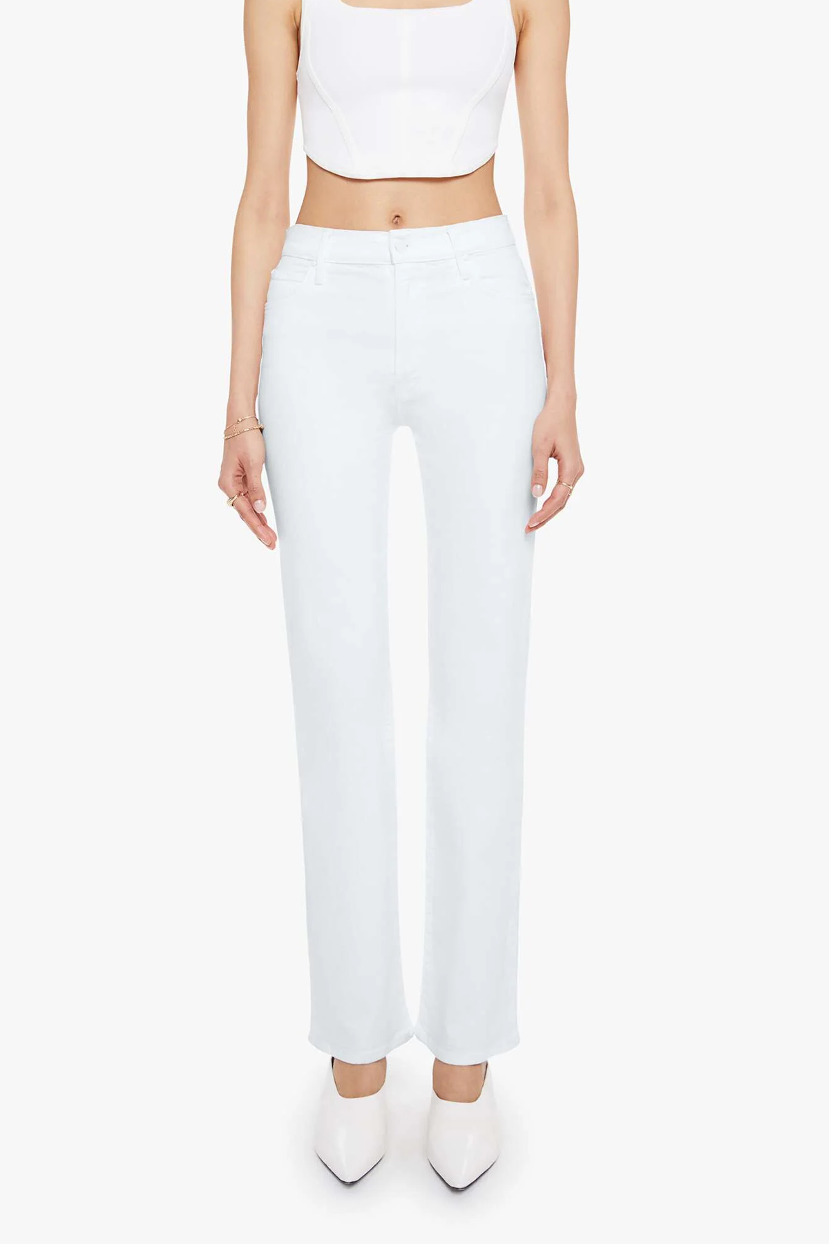 Person wearing a white outfit with high-waisted pants on a white background