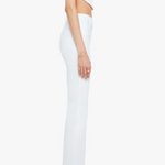 Person wearing a white outfit with high-waisted pants on a white background