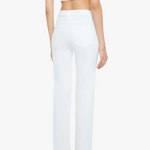 Person wearing a white crop top and high-waisted pants on a white background