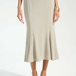 Champagne sparkle knit trumpet skirt with flared hem