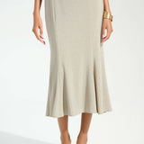 Champagne sparkle knit trumpet skirt with flared hem