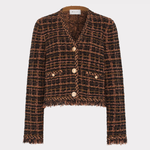 A cropped tweed jacket in a brown and black plaid pattern with gold buttons, displayed on a neutral light gray background.