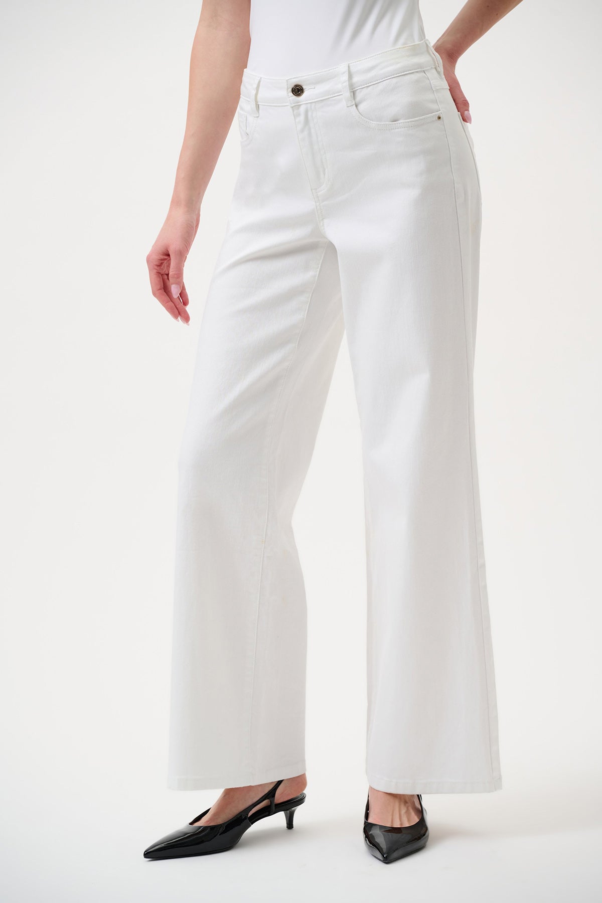 White wide-leg stretch denim jeans with high-rise fit.