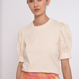 Model wearing a crewneck short-sleeve T-shirt with a relaxed fit.