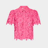 pink lace top on white background 