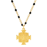 Gold necklace with a cross pendant and black beads on a white background