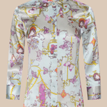 Long-sleeve shirt with colorful abstract pattern on a beige background