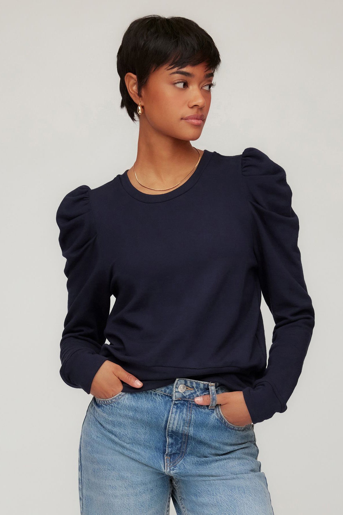 Top with puff sleeves and a clean, modern silhouette