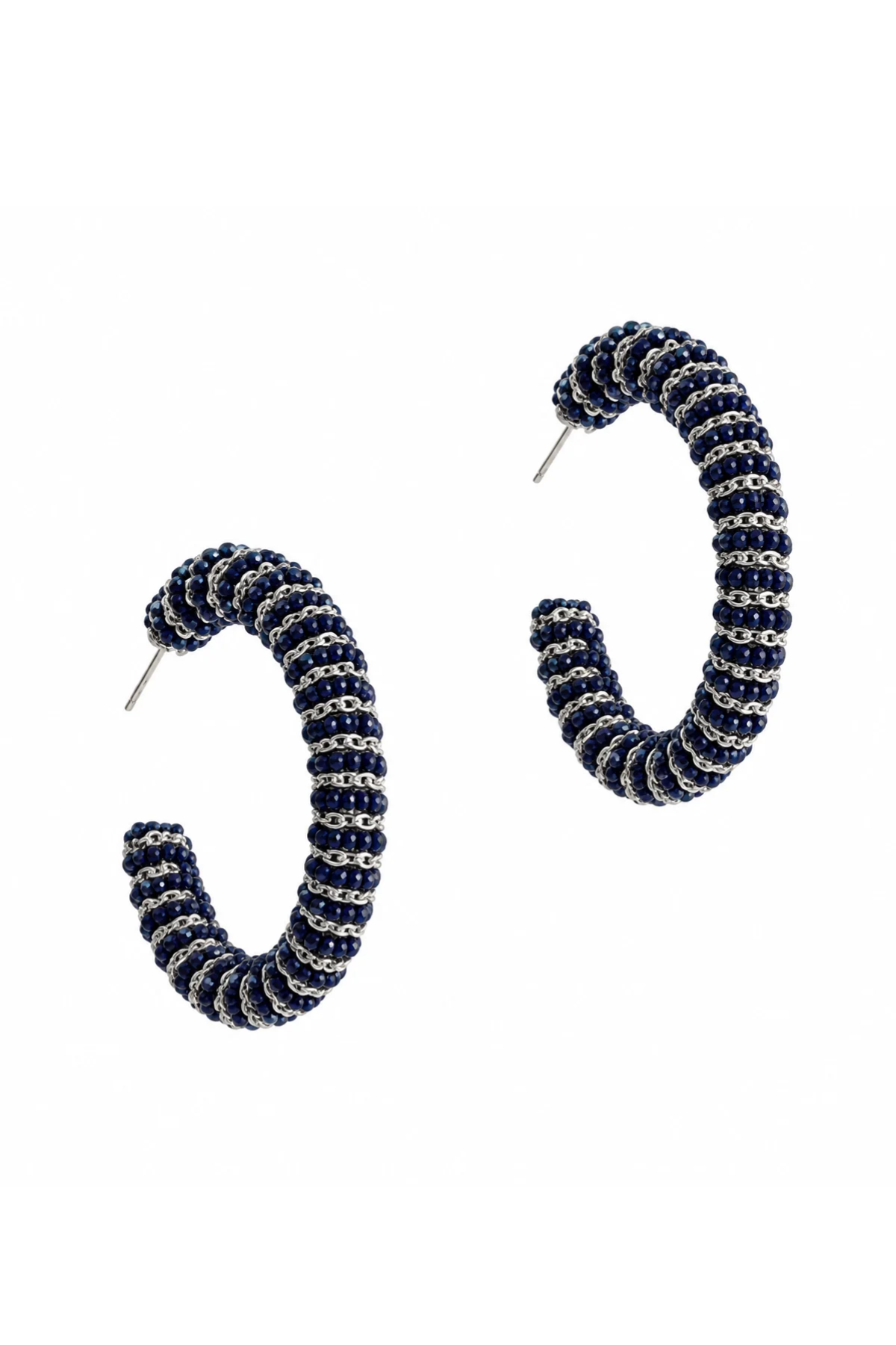 A pair of open hoop earrings with a textured spiral pattern in navy blue and silver, shown on a plain white background.
