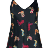 Black slip top with colorful cowboy boot pattern on a white background