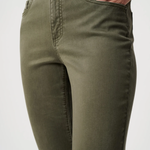 Olive green pants worn by a person on a white background