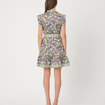 Woman wearing a floral dress on a white background