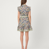 Woman wearing a floral dress on a white background